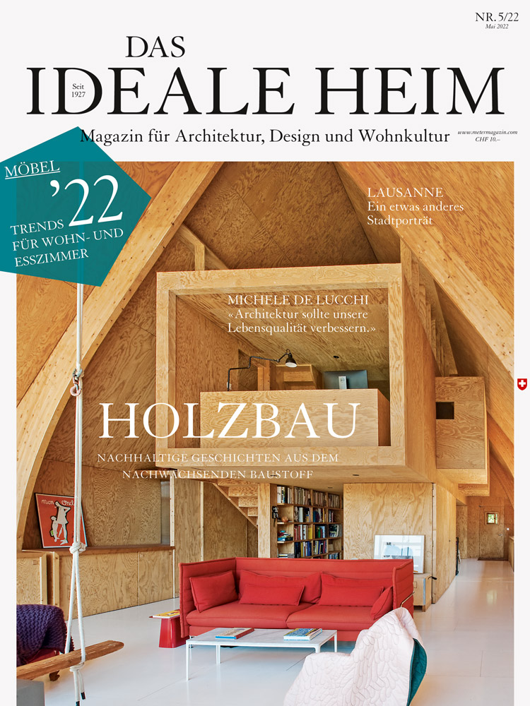 Titelbild Das Ideale Heim mit Wohnzimmerbild eines offenen Innenausbaus.