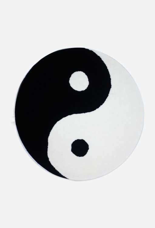 Runder Teppich mit «Yin und Yang»-Motiv aus der neuen Vibe Kollektion von Schönstaub.